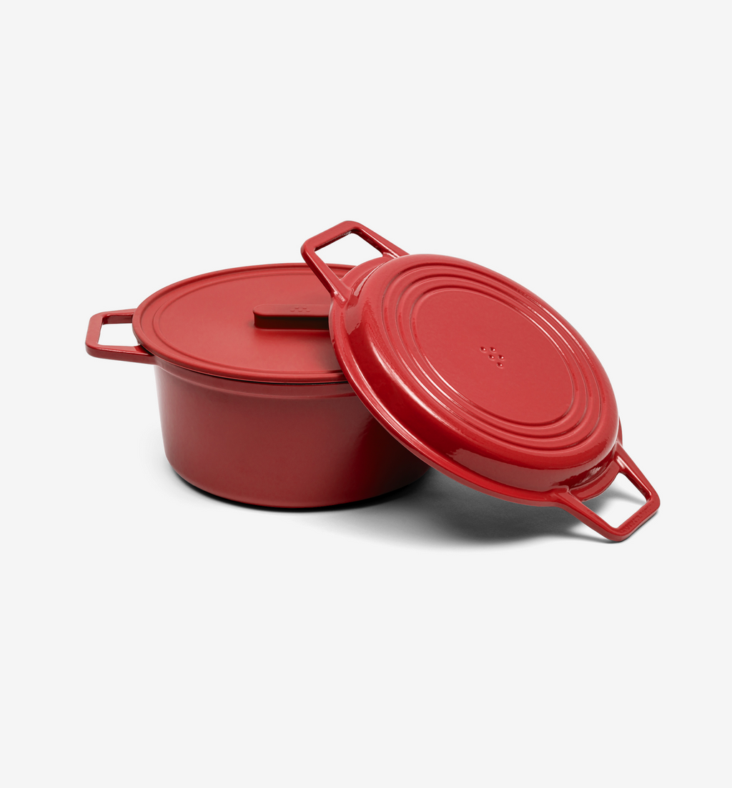 Red enameled cast iron Dutch oven with lid, 5-quart oval cocotte cookware